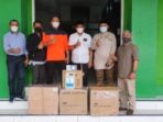 BPBD Sulteng Serahkan 6000 Masker dan 16 Liter Hand Sanitizer ke Unismuh Luwuk