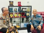 Kabidhumas Polda Sulteng, Kombes Pol Djoko Wienartono bersama Ketua PWI Sulteng, Tri Putra Toana